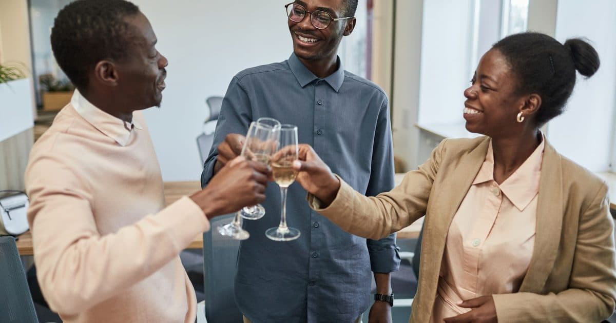 Professional presenting results in a meeting while building their LinkedIn presence